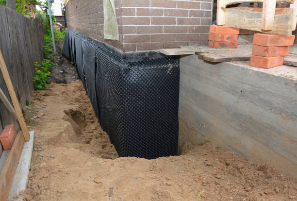 Happy homeowners after waterproofing job in Wapakoneta
